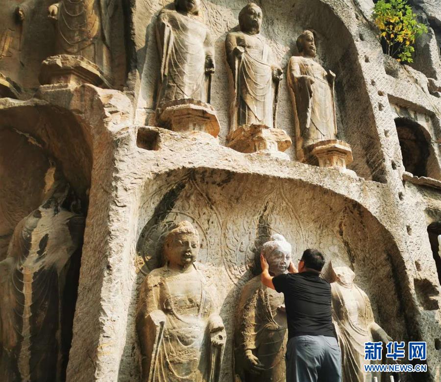 （圖文互動）（4）合體了，龍門石窟流散佛首首次實(shí)現(xiàn)“數(shù)字復(fù)位”
