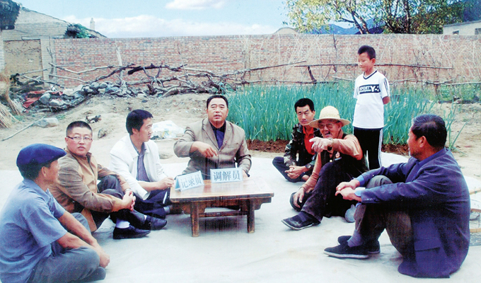 調(diào)解“家長里短，雞毛蒜皮”的小事情是李培斌從事的大事業(yè)