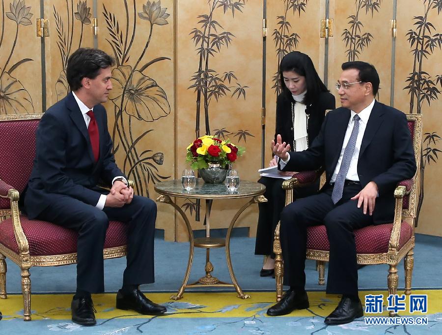 6月18日，國(guó)務(wù)院總理李克強(qiáng)在倫敦會(huì)見(jiàn)英國(guó)工黨領(lǐng)袖埃德·米利班德。新華社記者 龐興雷 攝