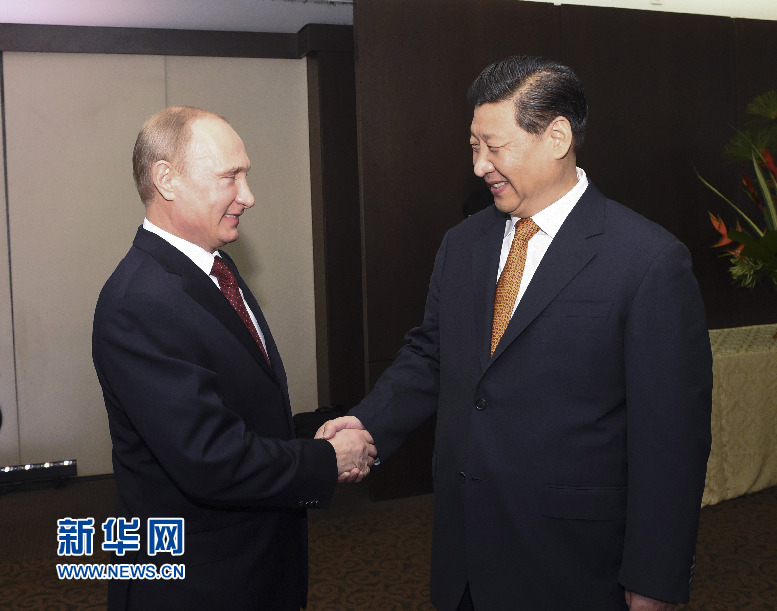 7月14日，國家主席習(xí)近平在巴西福塔萊薩會見俄羅斯總統(tǒng)普京。新華社記者李學(xué)仁攝