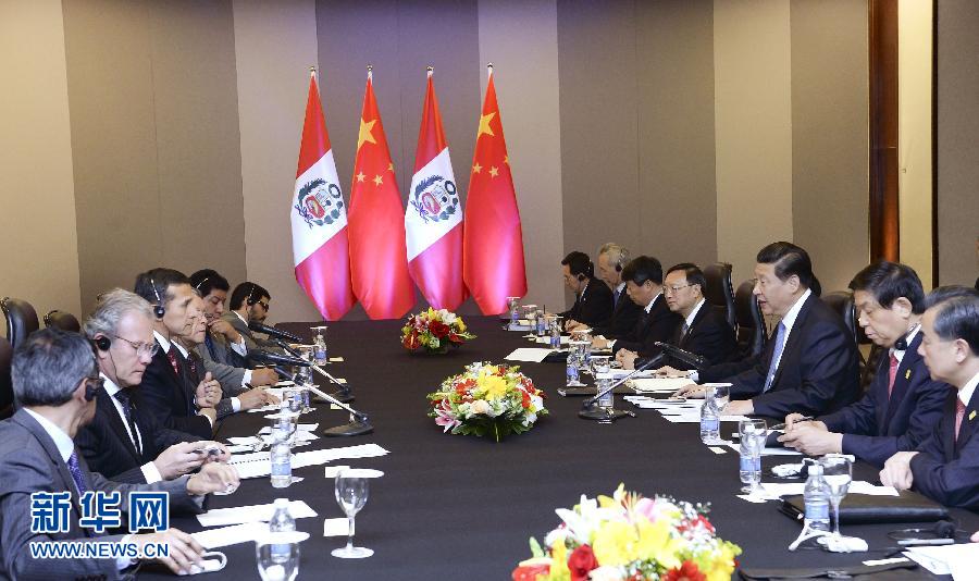 7月16日，國家主席習(xí)近平在巴西首都巴西利亞會見秘魯總統(tǒng)烏馬拉。新華社記者 劉建生 攝  