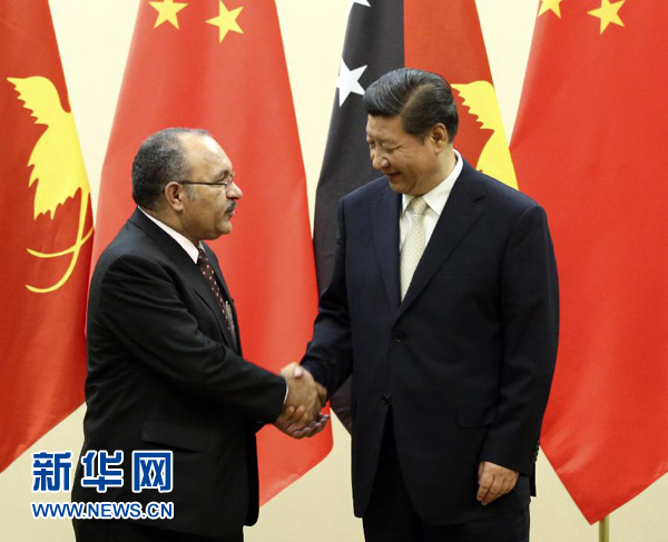 11月22日，國家主席習近平在斐濟楠迪會見巴布亞新幾內(nèi)亞總理奧尼爾。 新華社記者姚大偉攝 