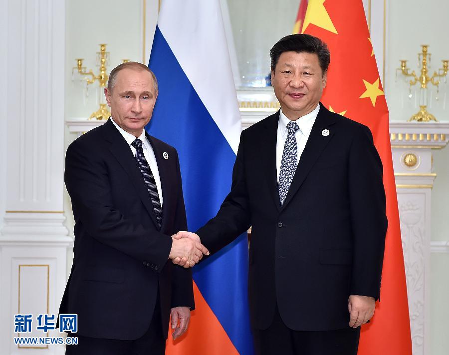 6月23日，國家主席習(xí)近平在烏茲別克斯坦塔什干會見俄羅斯總統(tǒng)普京。新華社記者李濤攝