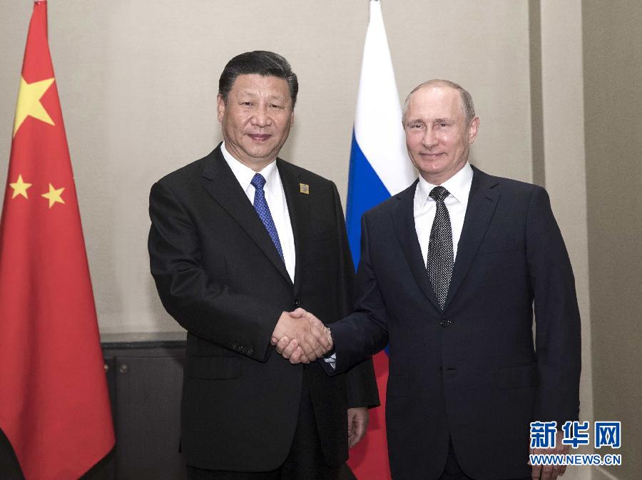 6月8日，國家主席習(xí)近平在阿斯塔納會(huì)見俄羅斯總統(tǒng)普京。 新華社記者蘭紅光 攝