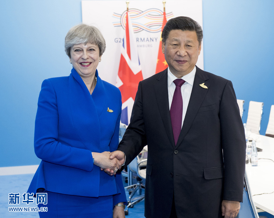 7月7日，國(guó)家主席習(xí)近平在漢堡會(huì)見(jiàn)英國(guó)首相特雷莎·梅。 新華社記者李學(xué)仁 攝